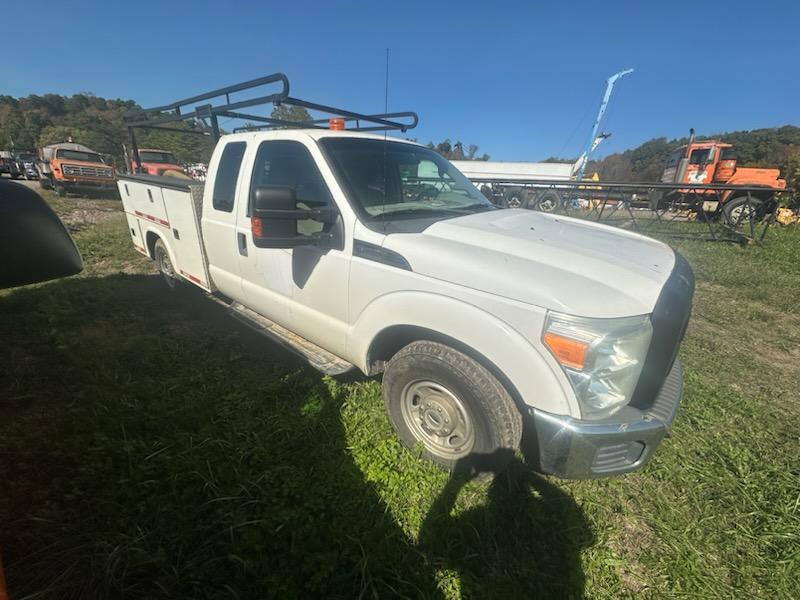 P1223	2011 Ford F250 2WD Utility Bed	256KMiles/Hours,	High Miles