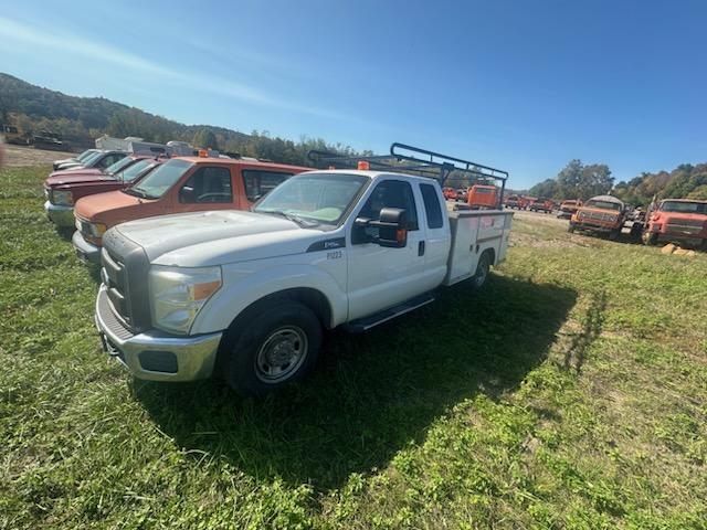 P1223	2011 Ford F250 2WD Utility Bed	256KMiles/Hours,	High Miles